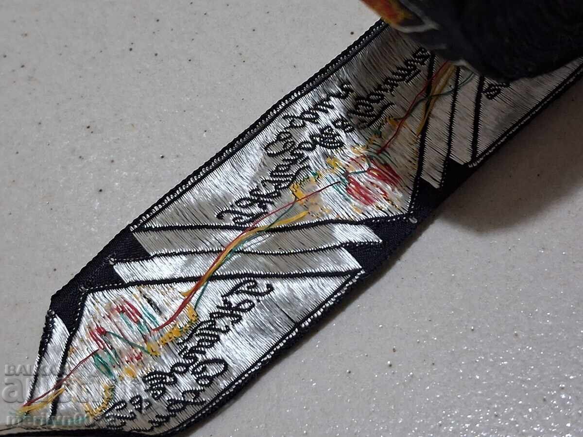 Delivery of Silk ball with emblems, company logo for branded clothes, coat of arms