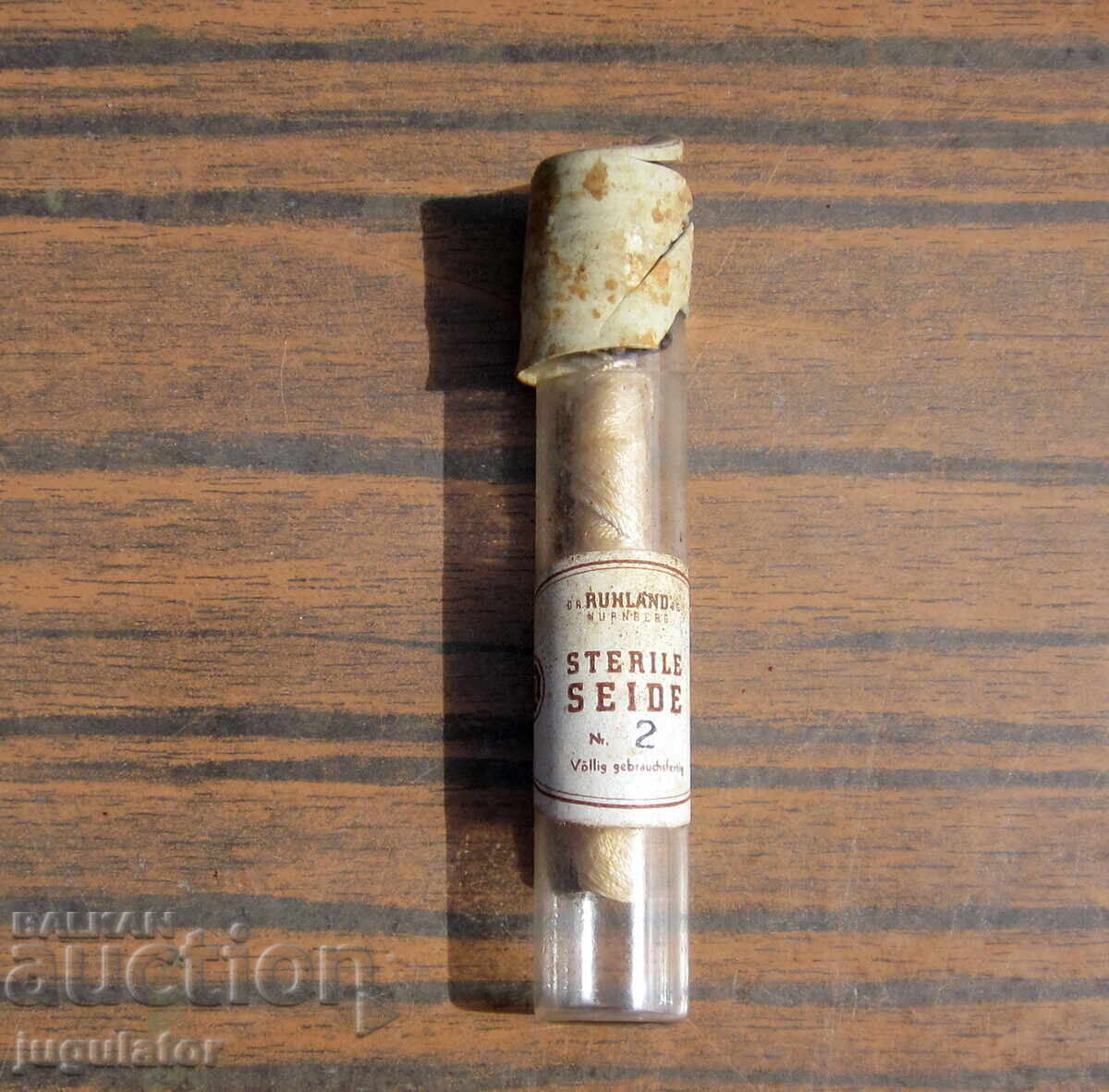 Licitație Fir chirurgical medical german vechi într-o sticluță