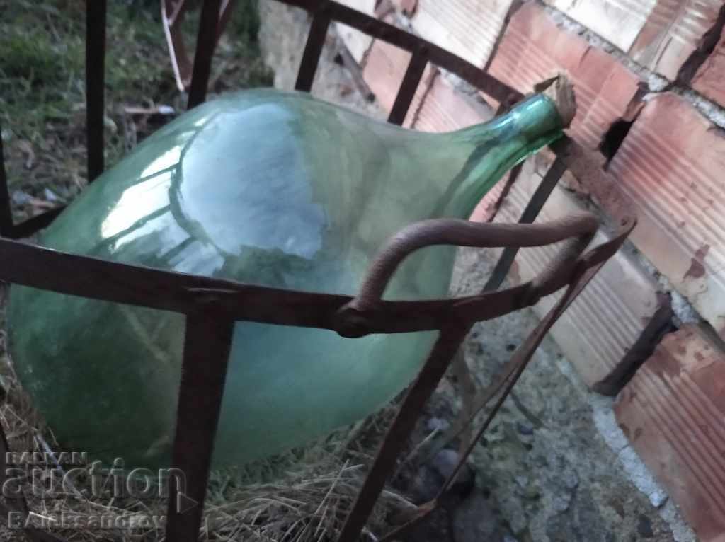 Delivery of Large glass demijohn with a metal basket