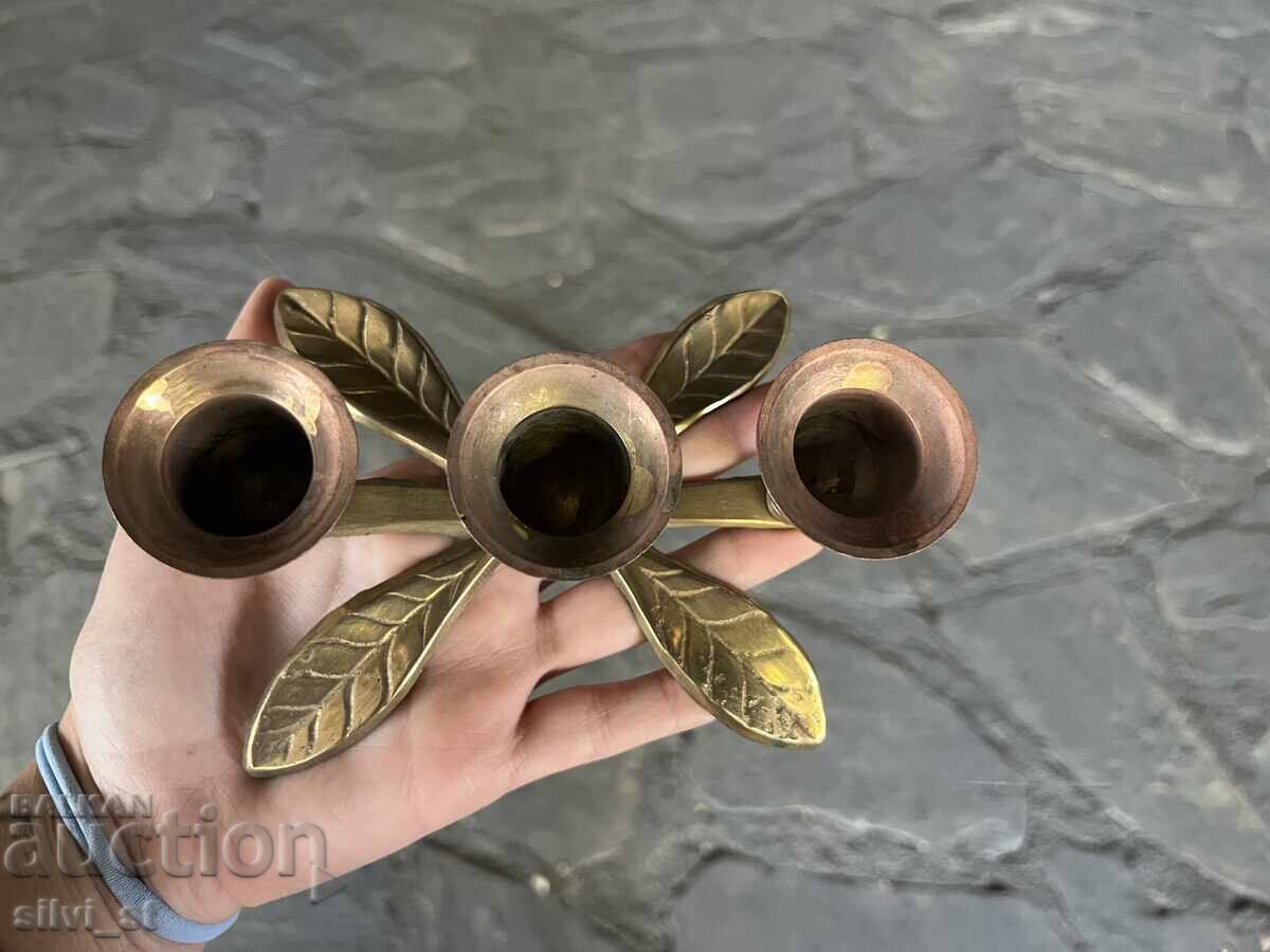 Auction  Bronze candlestick