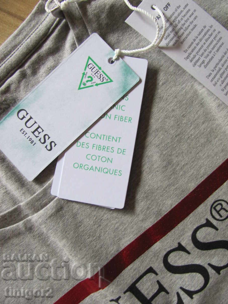 Delivery of New with tag women's blouse GUESS size S