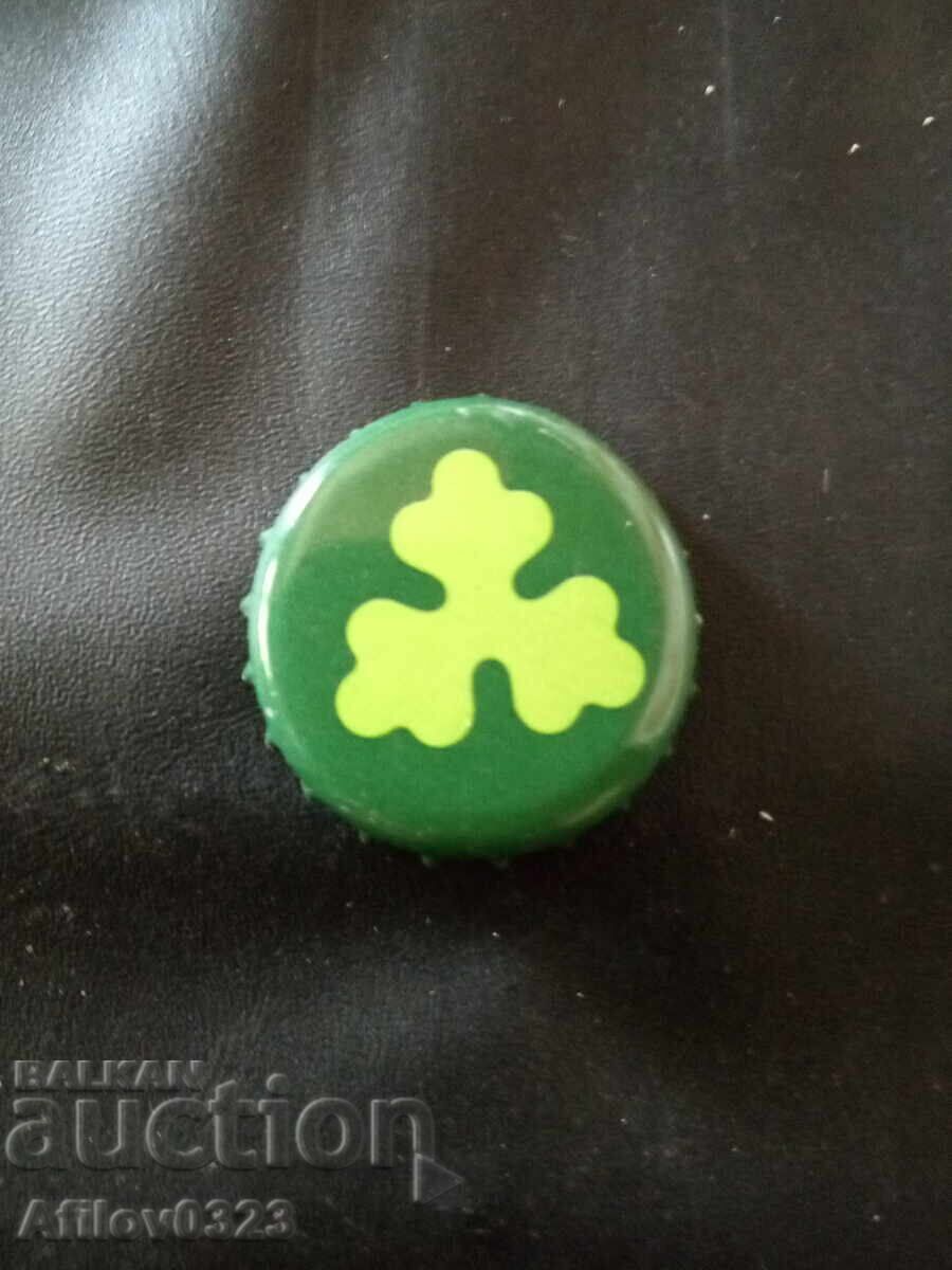 Capac metalic verde cu figură triunghiulară Capac metalic verde cu figură triunghiulară