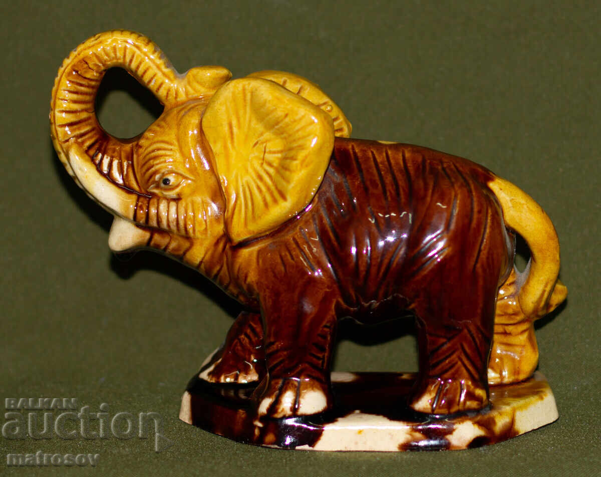 Delivery of Decorative ceramic elephant figurine