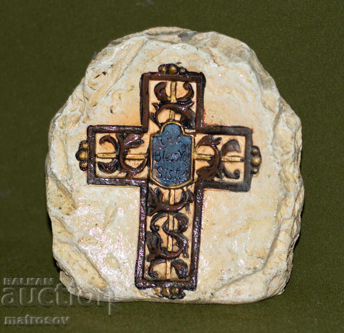 Auction  Hand-carved stone sculpture, cross