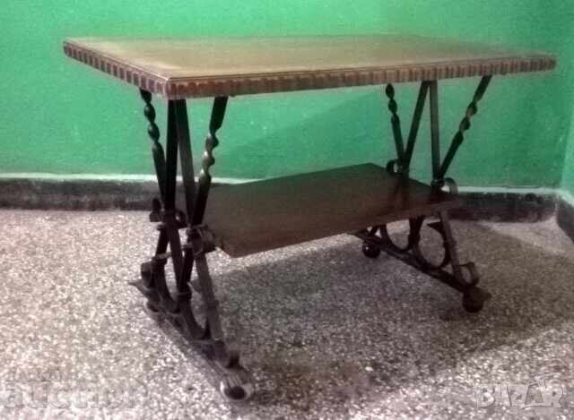 Old, massive wrought iron coffee table