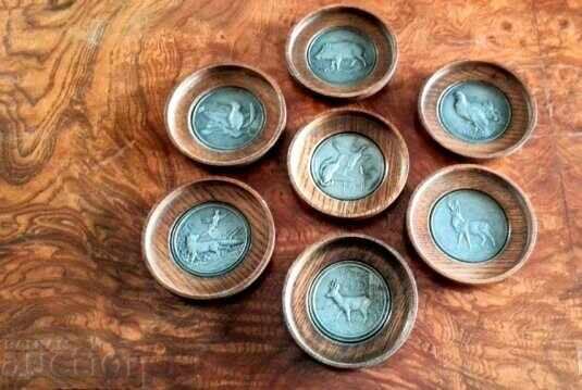 Coasters with hunting motifs
