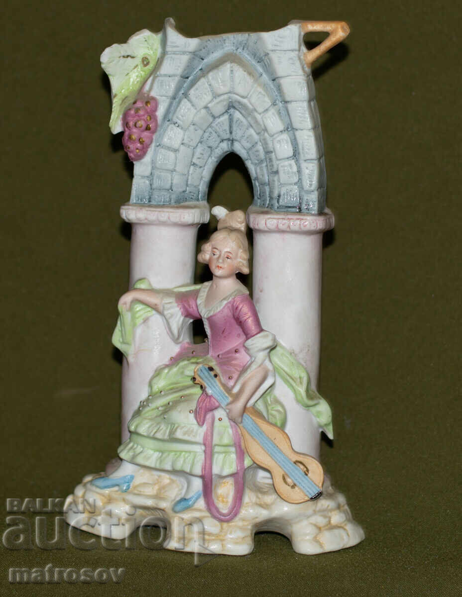 Decorative ceramic figurine of a woman