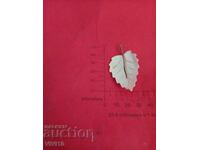 Antique brooch with mother-of-pearl