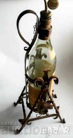 3L bottle with wrought iron swing from the 60s