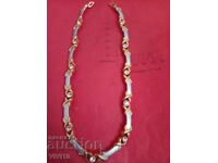 Antique metal necklace with stones