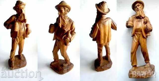 Old large wooden figure of a hunter with a pipe and a beer mug with price 165.00 BGN | € 84.36