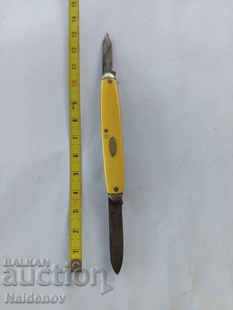 Micul cuțit de colecție "Țar" cu mâner de fildeș?