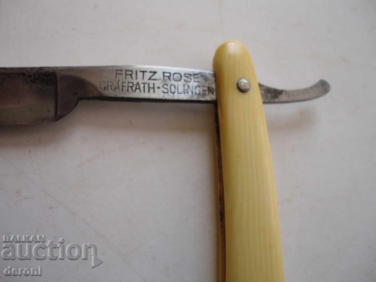 Auction  Incredible Solingen razor with silver inlays