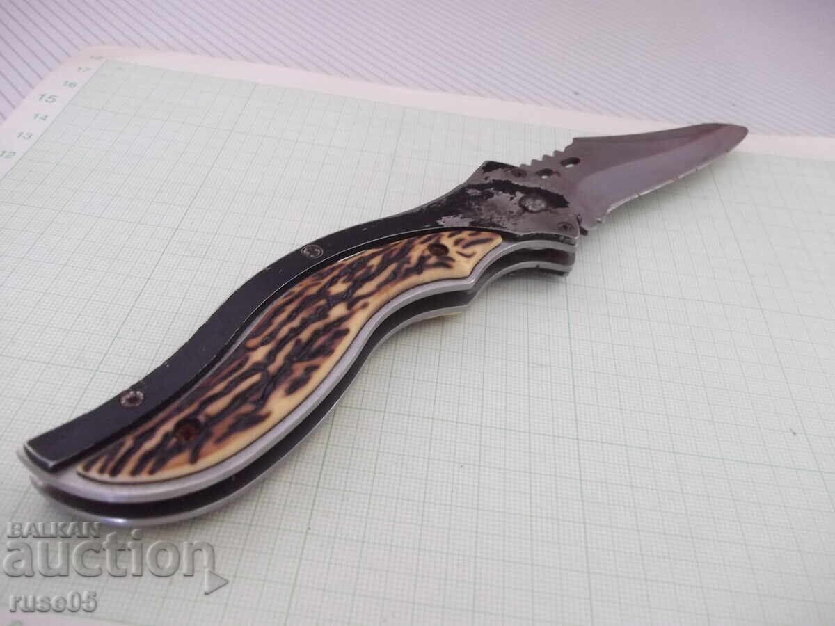 Briceag pliabil semi-automat - 4 - 5 Briceag pliabil semi-automat - 4 - 5