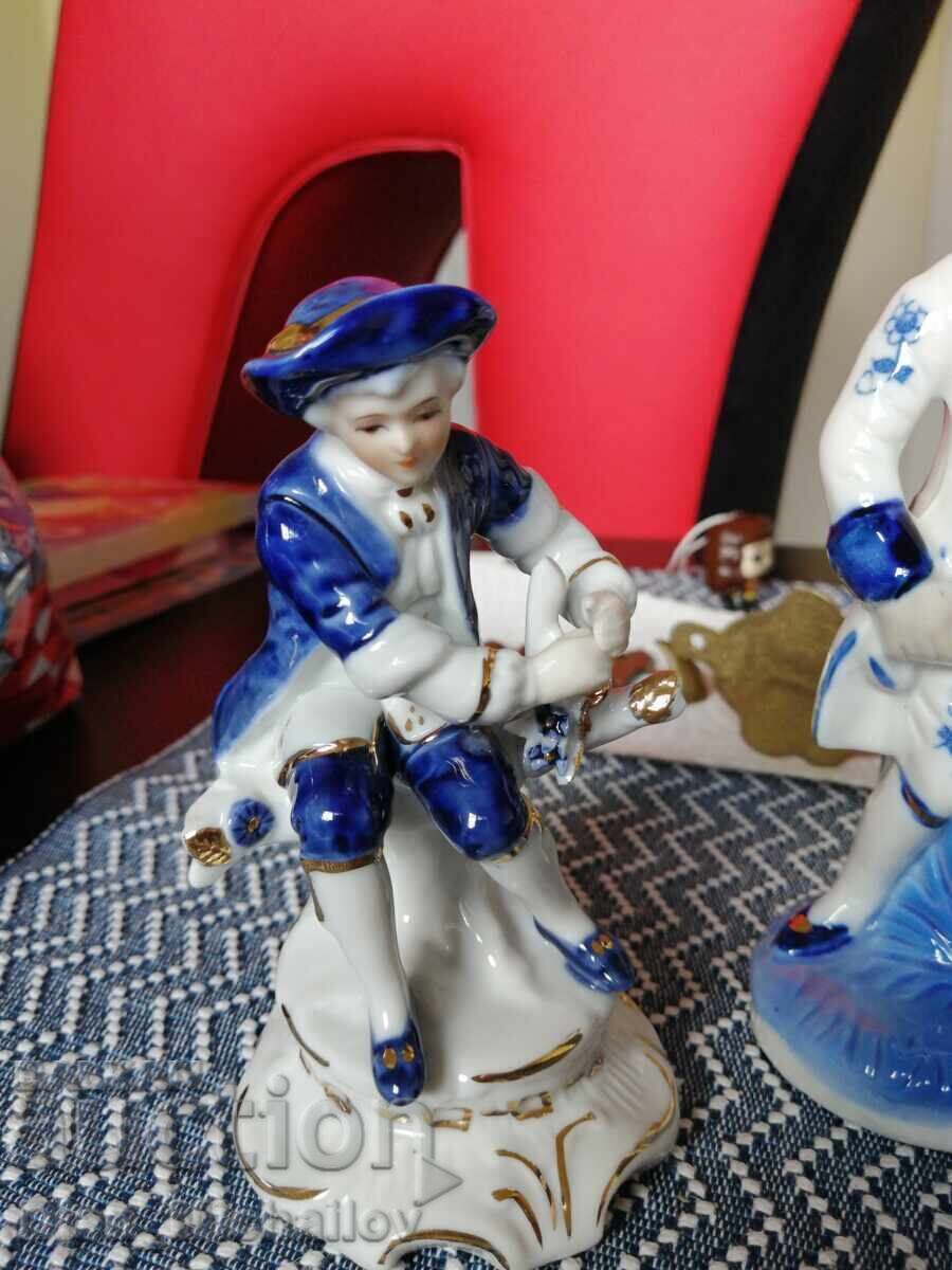 Livrarea Două figurine de porțelan