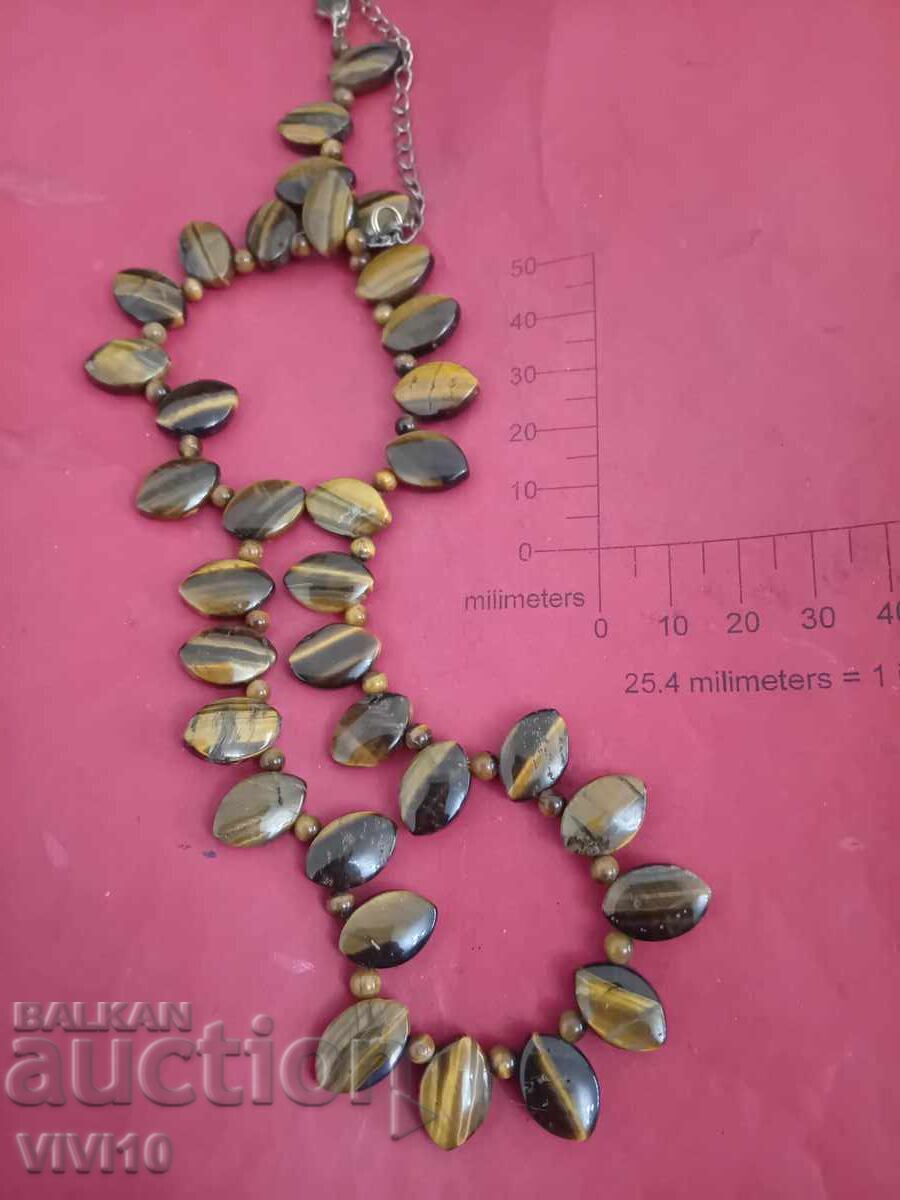 Colier vechi cu ochi de tigru cu preț € 30.00 | 58.68 BGN Colier vechi cu ochi de tigru cu preț € 30.00 | 58.68 BGN