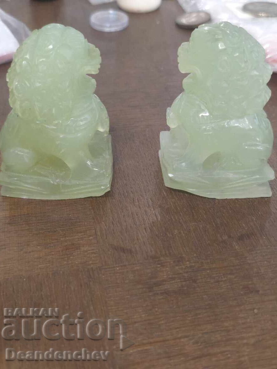 Pair of jade Foo dog sculptures with price 150.00 BGN | € 76.69