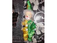 Păpușă pe balansoar clovn