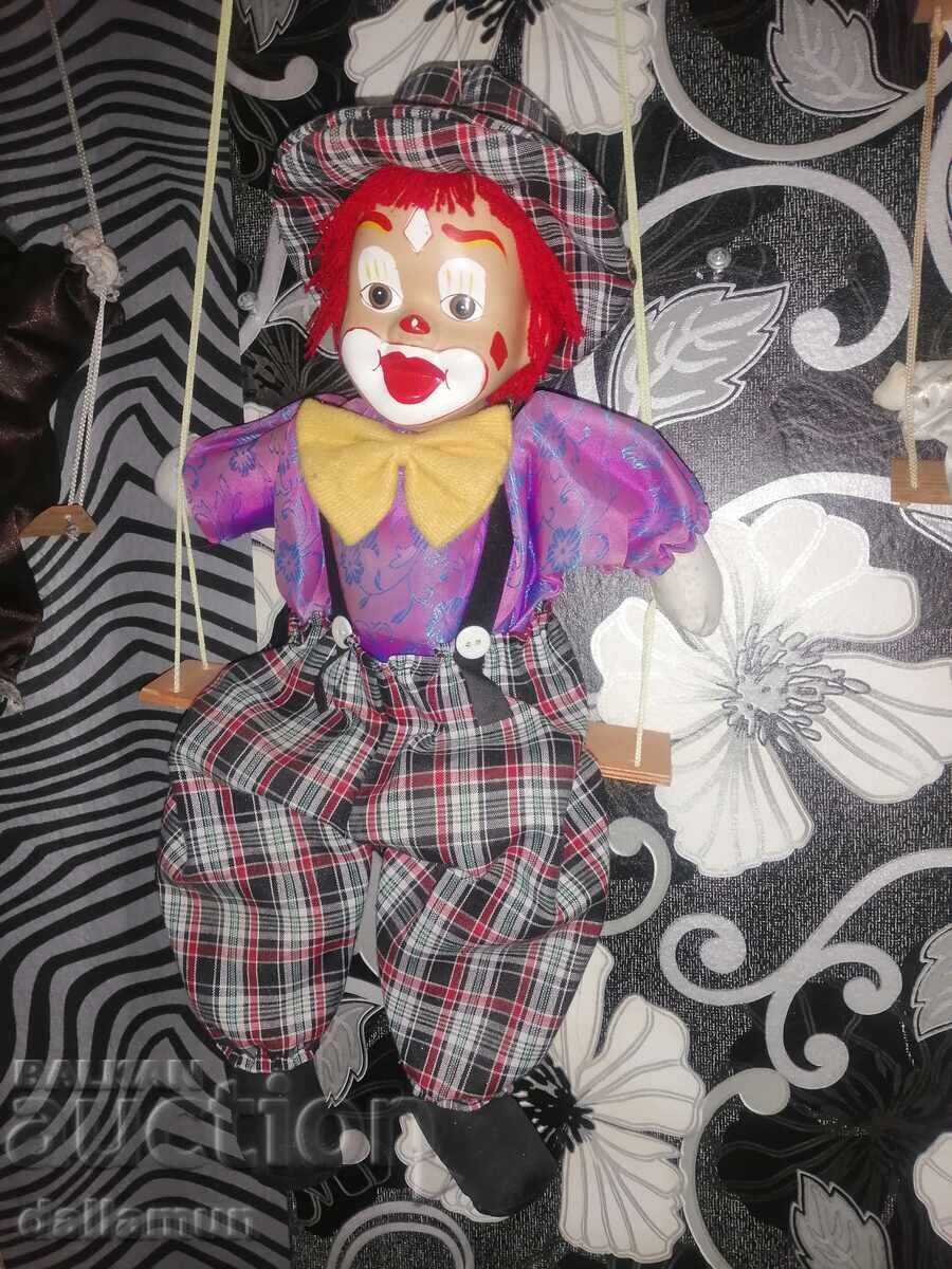 Clown doll on a swing with price 10.00 BGN | € 5.11