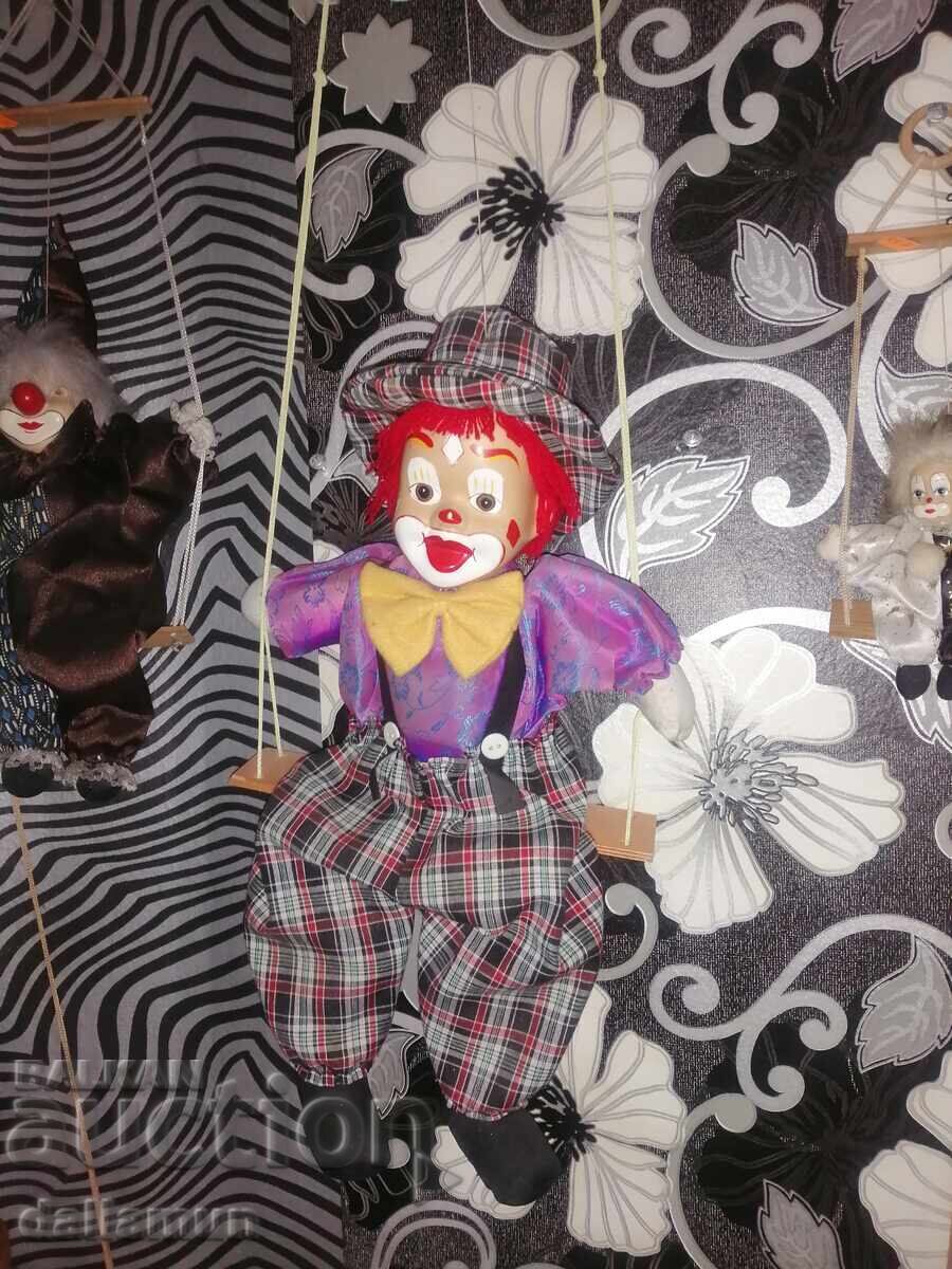 Clown doll on a swing