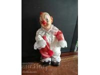 Păpușă clovn muzicală