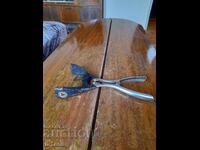 Clești vechi, un dispozitiv pentru îndepărtarea borcanelor