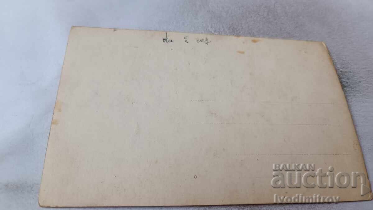 Photo of a man, woman, and little girl in front of a single-family house with price 6.65 BGN | € 3.40 Photo of a man, woman, and little girl in front of a single-family house with price 6.65 BGN | € 3.40