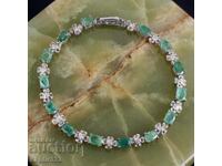 Designer bracelet with natural emeralds and sapphires
