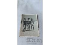 Photo Woman boy and girl on the beach