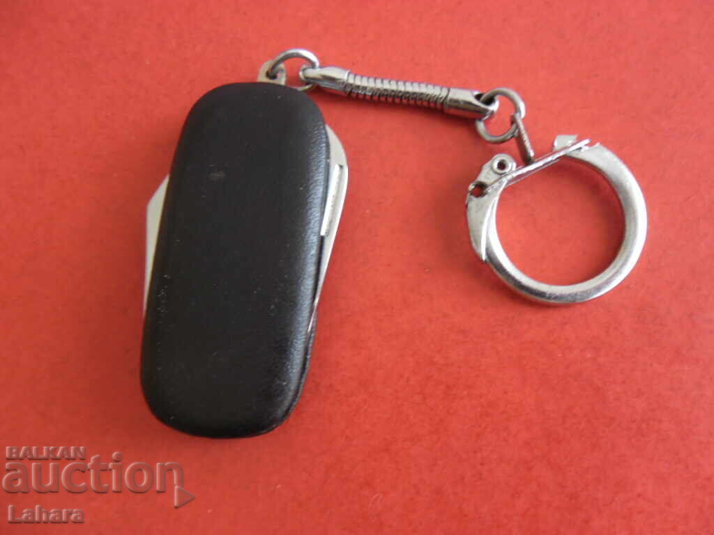 Keychain, bottle opener knife with price 5.00 BGN | € 2.56 Keychain, bottle opener knife with price 5.00 BGN | € 2.56