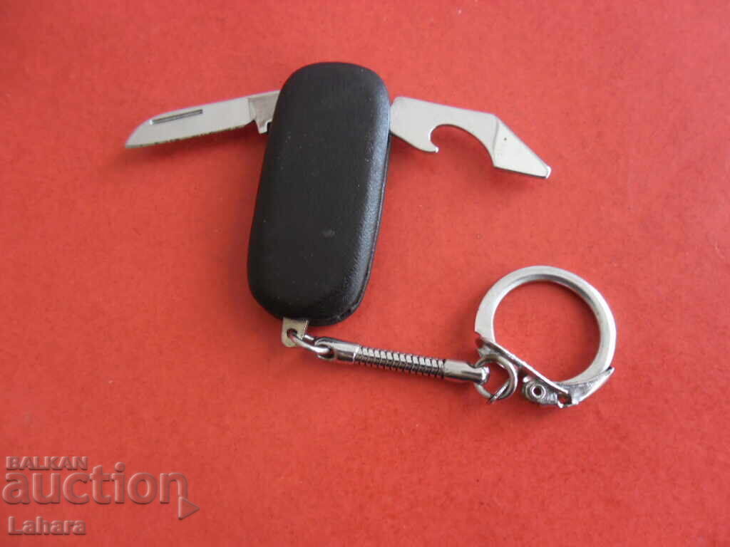 Auction Keychain, bottle opener knife Auction Keychain, bottle opener knife