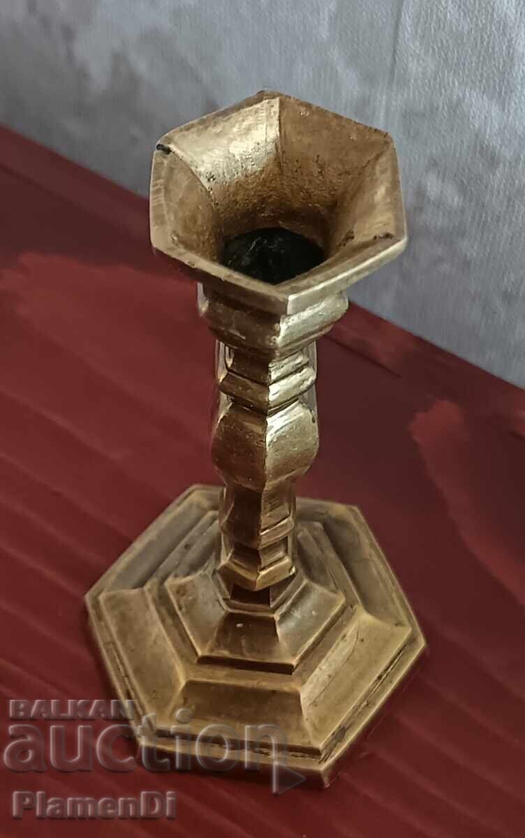 Auction  Old bronze candlestick