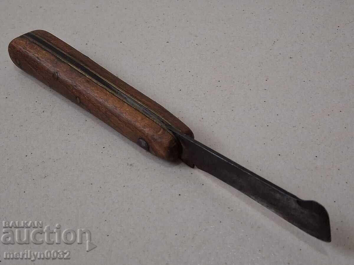 Delivery of Old vine knife with wooden handles with markings Delivery of Old vine knife with wooden handles with markings