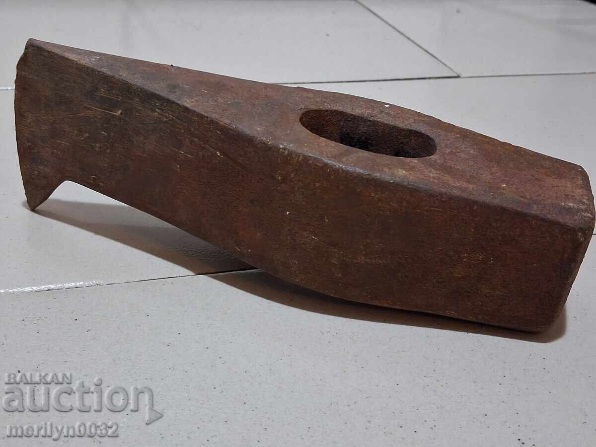 Old heavy hammer chisel pickaxe