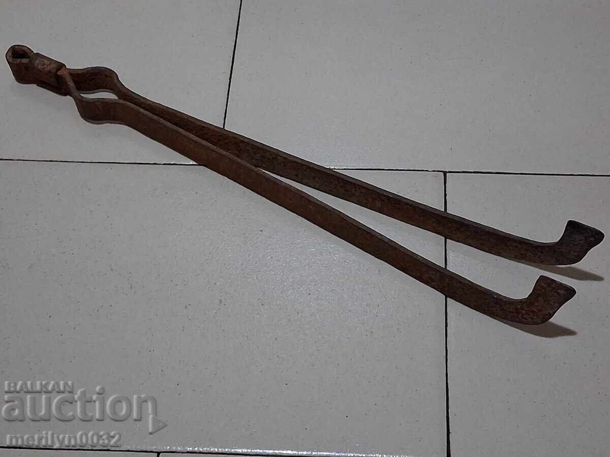 Old dilaf, tongs, wrought iron for oven