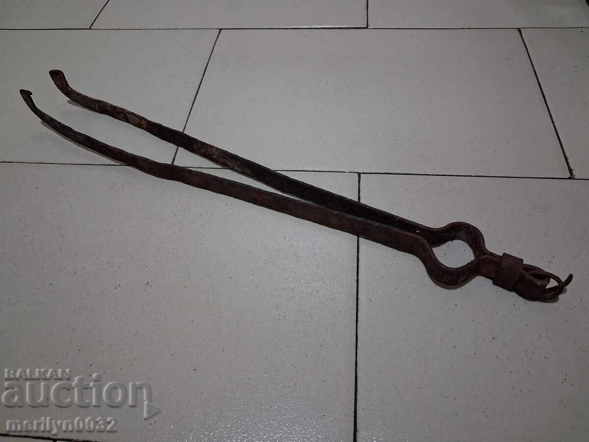 Old dilaf, tongs, wrought iron for oven