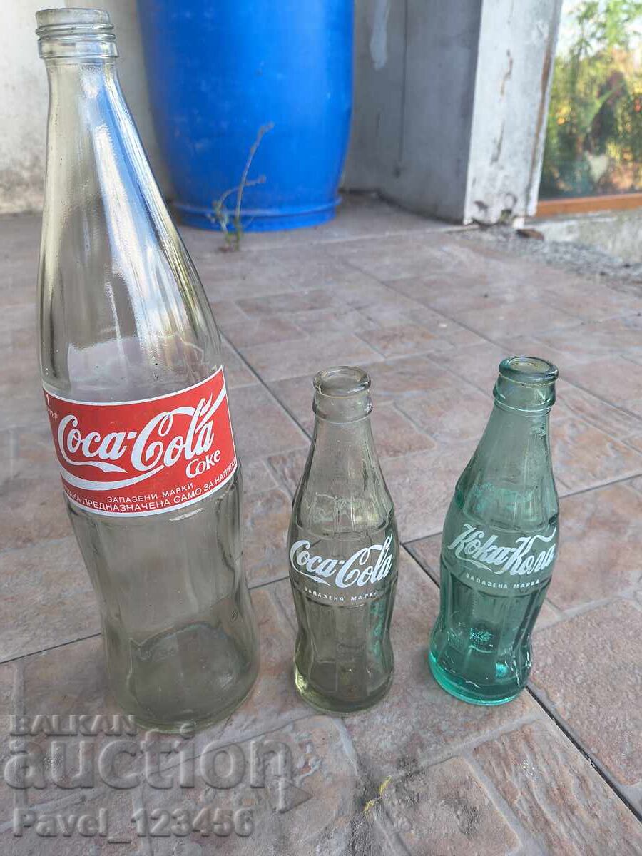 Licitație Sticle vechi de Coca-Cola Licitație Sticle vechi de Coca-Cola
