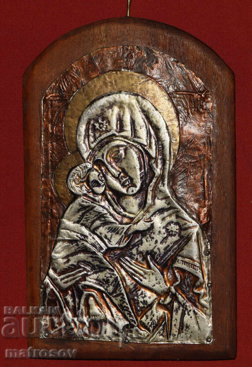 Handmade metal icon of the Virgin Mary and Child