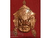 Masca lucrată manual, Zeitate asiatică