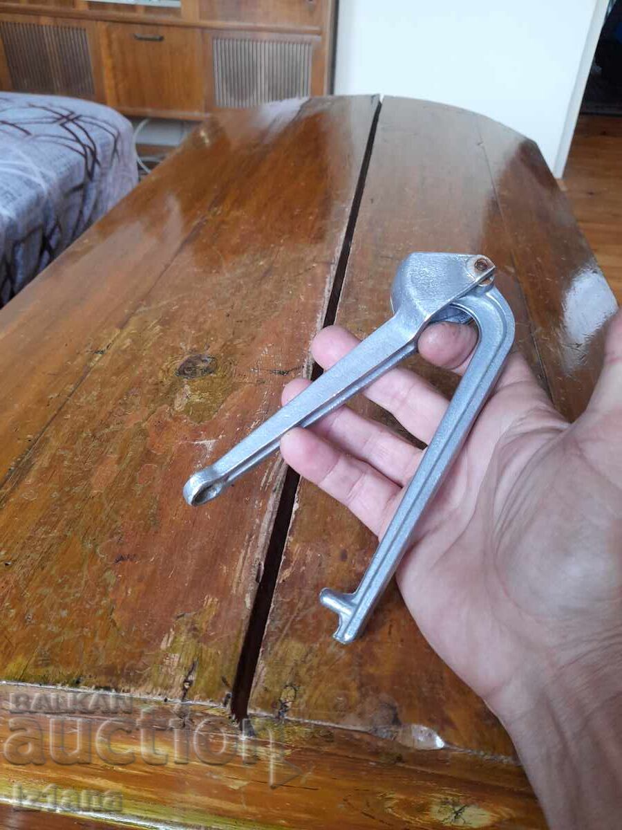 Auction  Old aluminum garlic press