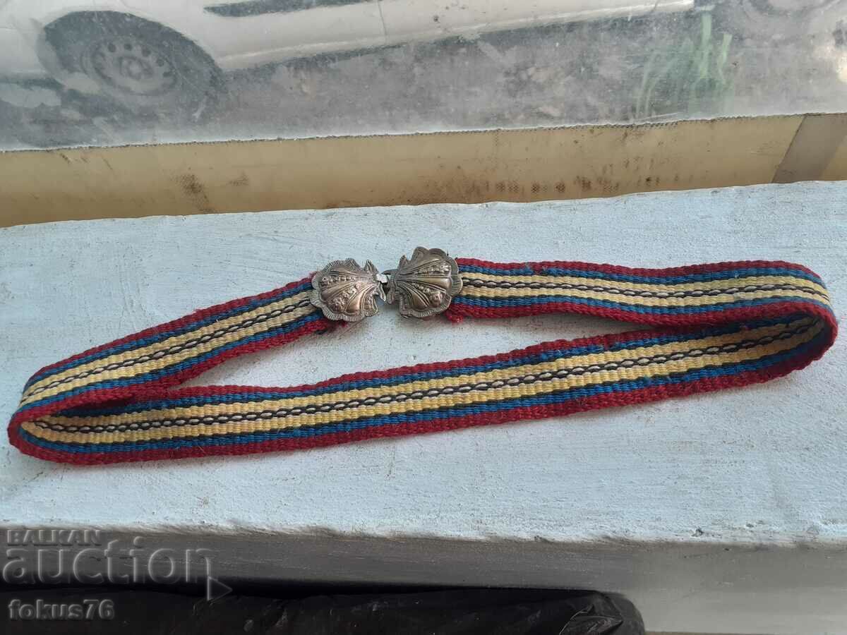 Knitted woolen belt with small bronze pofts for costume - children's with price 70.00 BGN | € 35.79