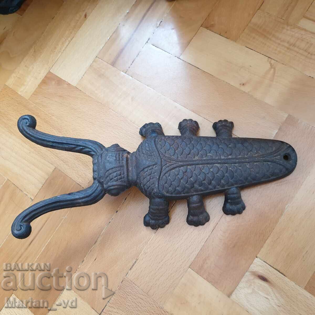 Delivery of Old cast iron boot jack