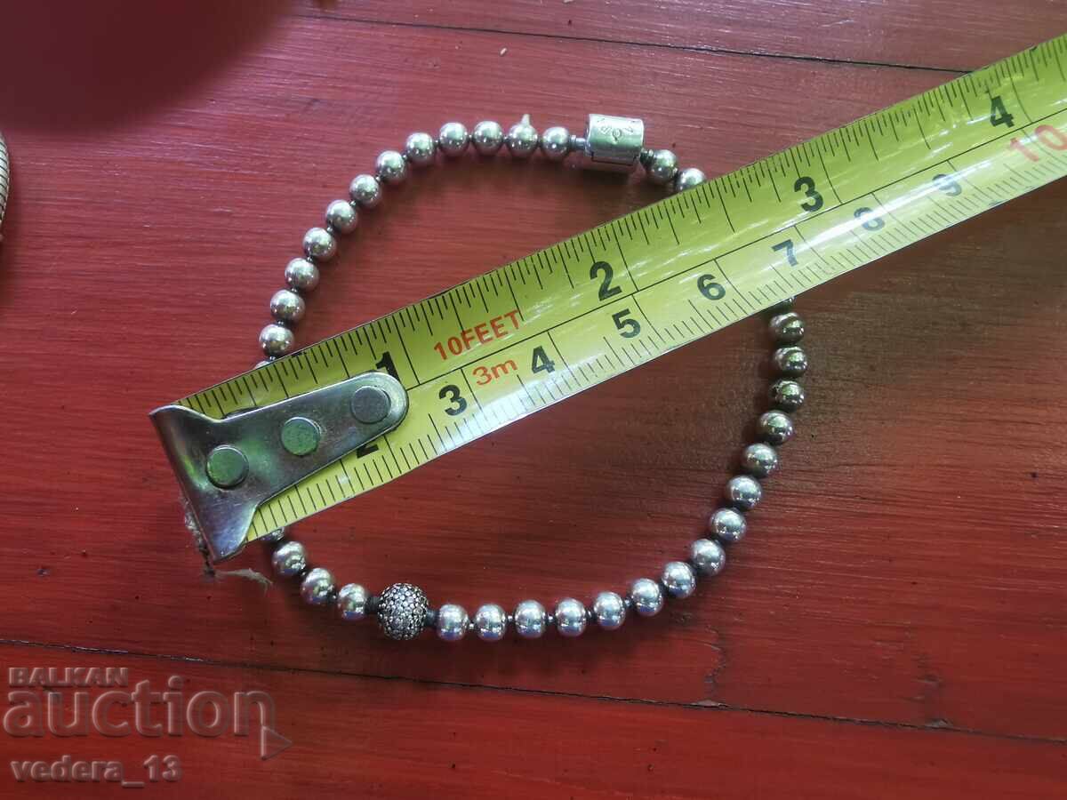 Auction  Silver Pandora bracelet - 2 pieces AND charms