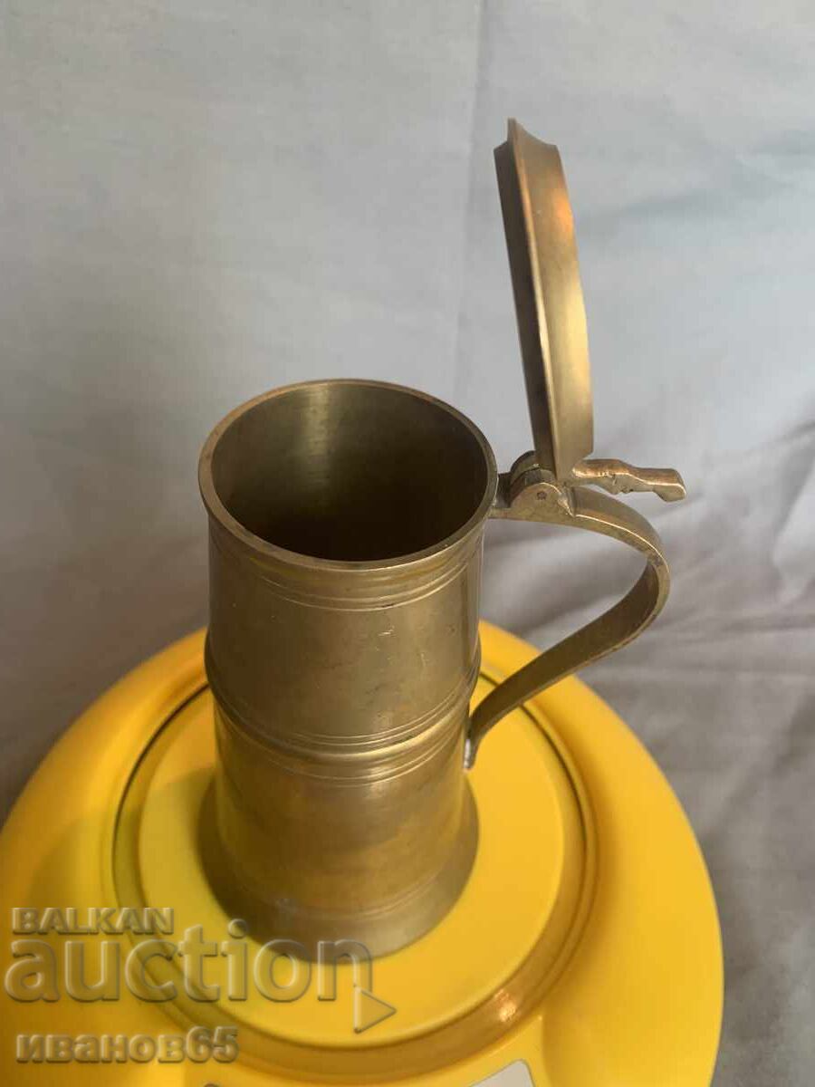 Auction Brass mug Auction Brass mug