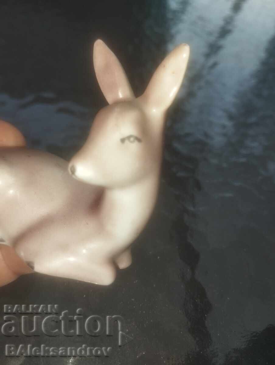 Delivery of Porcelain fawn with a marking rod