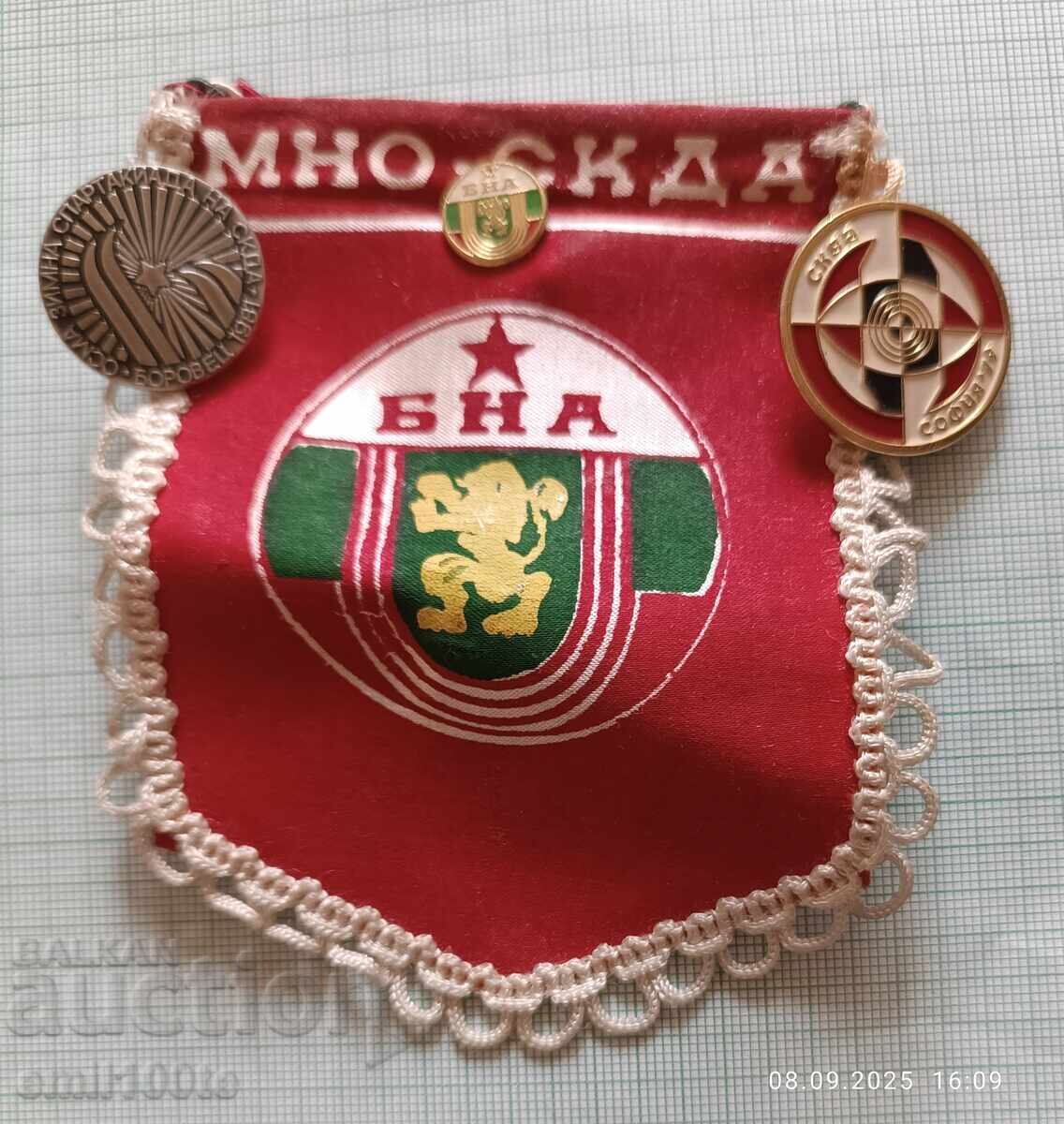 Flag with 3 BNA MNO SKDA badges