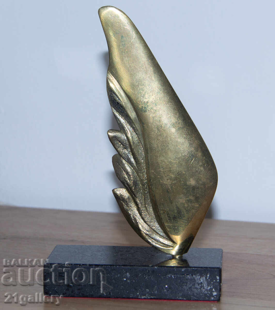 Auction  Author's bronze sculpture, stylized wing
