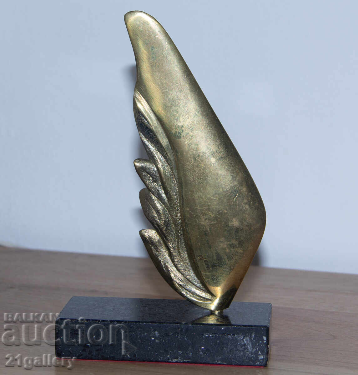 Author's bronze sculpture, stylized wing