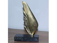 Author's bronze sculpture, stylized wing