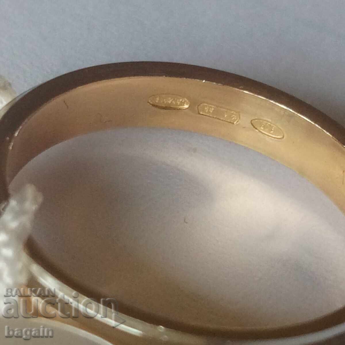 Auction  Sterling silver ring with gold plating.